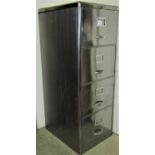 A polished steel four drawer filing cabinet (with key)