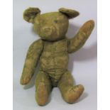 A pre WW2 vintage teddy bear, possibly by Merrythought, with jointed body, original paw pads,
