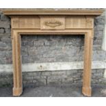 A good quality reclaimed Georgian style stripped pine fire surround/chimney piece with fruiting