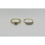 Two 9ct dress rings; a diamond cluster, size N and a three stone CZ example, size O/P, 3.2g total (