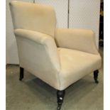 An Edwardian drawing room chair upholstered in Calico on turned forelegs