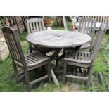 A Marks & Spencer Home suite of garden furniture comprising table of circular form with slatted top,
