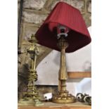 A good quality Adam style gilt brass table lamp, with triform rams head decoration, together with