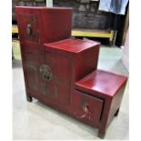 A Contemporary Chinese crimson lacquered side cupboard of stepped form with chinoiserie detail, 81cm