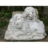 A pair of reclaimed recumbent lions with weathered later painted finish (Af), 64 cm long x 24 cm