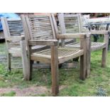 Four weathered steamer executive teak garden open armchairs with slender slatted seats and back (af)