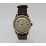 Vintage gents 9 ct manual wind wristwatch, champagne dial with Arabic numerals, subsidiary second