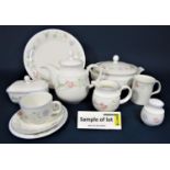 A quantity of Royal Doulton Expressions Summer Carnival pattern teawares comprising a two handled