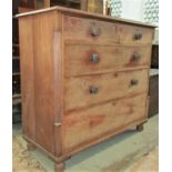 A Victorian mahogany bedroom chest of two short over three long graduated drawers flanked by