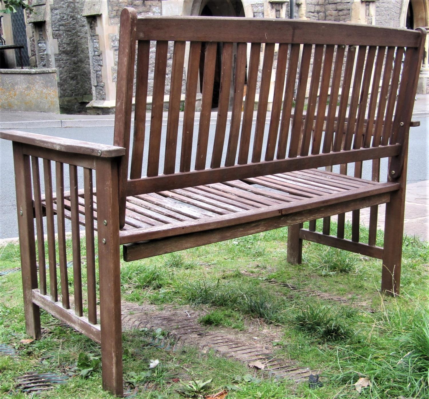 A contemporary weathered hardwood two seat garden bench with slatted seat, back and arms, (af) 126cm - Image 3 of 3