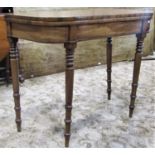 A mid-19th century mahogany D end foldover top tea table on turned supports