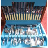 A teak cased canteen of cutlery