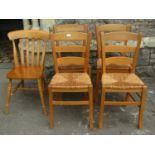 A set of four stained beechwood ladderback dining chairs with rush seats, raised on square cut and