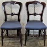 A pair of Victorian side chairs with carved detail and a further Swedish stick back chair