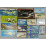 A collection of various scale model aircraft kits including kits by Revell, Heller, VEB and Kadar,