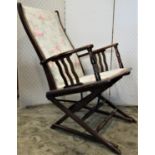 An Edwardian conservatory chair with adjustable framework, upholstered seat and back