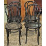 A set of four ebonised bentwood hoopback café chairs