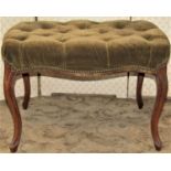 A late 19th century mahogany upholstered centre stool raised on a shaped and moulded supports, 70 cm