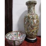 A large contemporary oriental vase in the 19th century manner with polychrome painted reserve panels