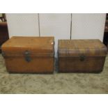 Two Victorian domed topped tin trunks of varying size with simulated wood grain finish