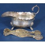 Georgian style silver cream jug with S scroll handle and scallop shell feet, maker EBS Ltd, London
