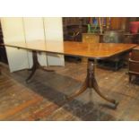A good quality reproduction Georgian mahogany dining room suite, the table raised on turned