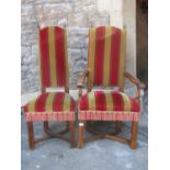 A set of ten (8+2) old English style oak dining chairs, raised on square cut and chamfered supports,