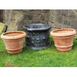 A good quality contemporary heavy glazed circular planter with repeating raised foliate detail,