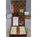Staunton style box wood and ebony chess set, height of king 8cm, within a old mahogany games box,
