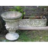 A reclaimed garden planter of rectangular form with raised relief detail/frieze of mediaeval style