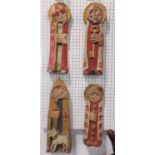 A set of four continental carved and painted soft wood figures of religious character, 40cm high