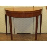 A simple mahogany D end foldover top card table, with gateleg action, raised on four square