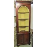 A pair of Georgian style mahogany free standing corner cupboards with partially painted interiors