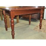 A small good quality Victorian style mahogany dining table, the rectangular top with rounded corners