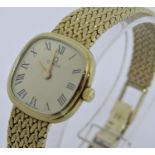 Ladies 9ct Omega quartz dress watch, the coloured dial with Roman numerals and gilt hands, 17mm