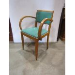 A 1940's French open armchair with stained beechwood frame raised on square tapered