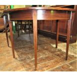 A Georgian mahogany D end three sectional dining table, the top crossbanded in satinwood, with