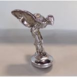A Rolls Royce silver plated mascot, The Spirit of Ecstasy, mounted upon a radiator cap, 16cm high