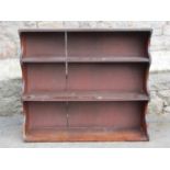 A flight of 19th century mahogany wall shelves, 75cm wide x 65cm high