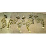 A set of five gothic style wall lights with naturalistic scrolling acorn and oak leaf branches,