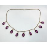 Edwardian silver gilt amethyst coloured paste fringe necklace