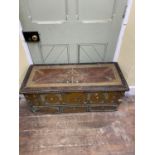 A 19th century Zanzibar chest, partially overlaid in brass enclosing three frieze drawers beneath