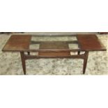 1960s teakwood occasional table of rectangular form, with partial glass top, under gallery and