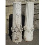 A pair of reclaimed architectural marble cylindrical column supports partially fluted with ring