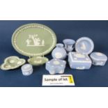 A collection of Wedgwood blue and sage green ground jasperwares including vases, lidded boxes, pin