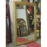 Antique gilt framed wall mirror of rectangular form, the moulded frame with repeating Greek key