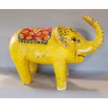 Indian papier mache figure of a standing elephant with hand painted polychrome decoration, 65cm long