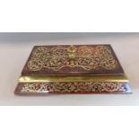 A 19th century scarlet boulle work and brass paperweight, 19cm max