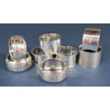 Eight various silver napkin rings, 7oz approx