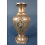 A good quality eastern silver and niello enamel inlaid baluster vase decorated with Islamic panels